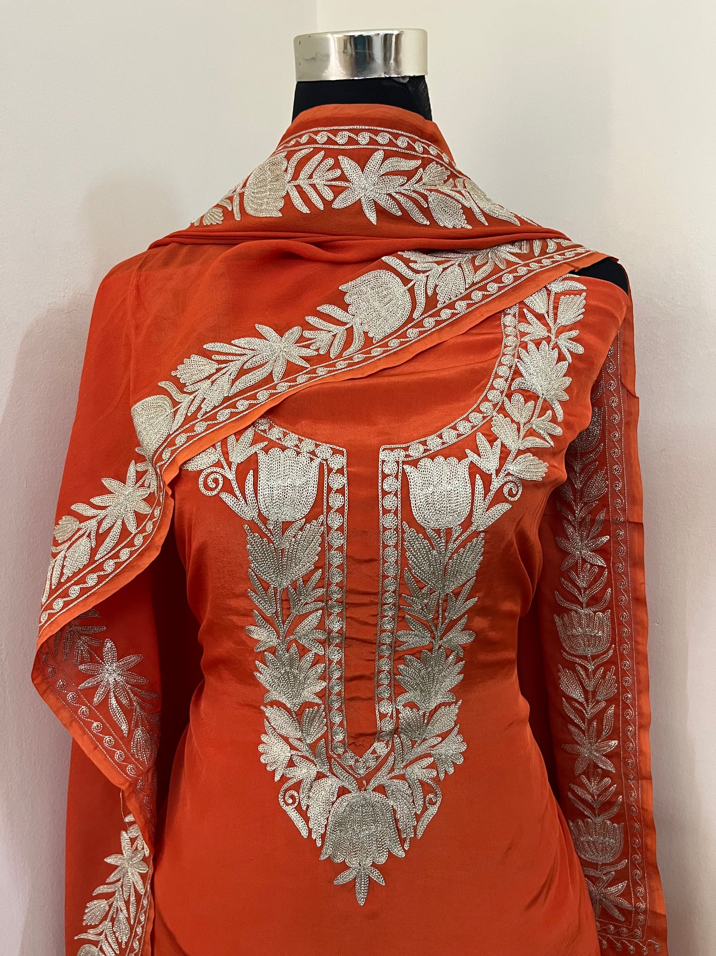 Kalaa’ Orange Crape Kashmiri Suit