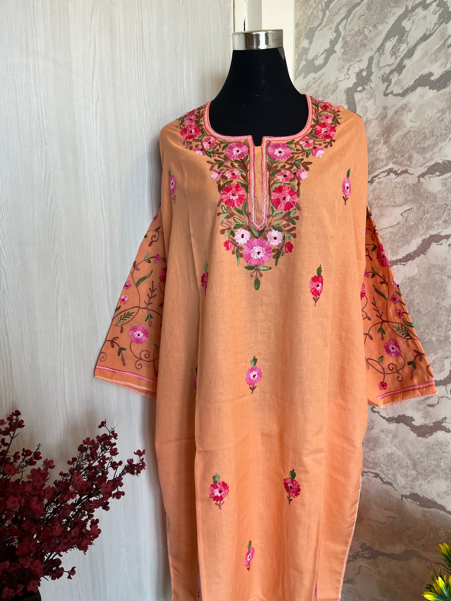 ‘Bageecha’ Peach Cotton Semi Stitched Cream Aari Work Kurti