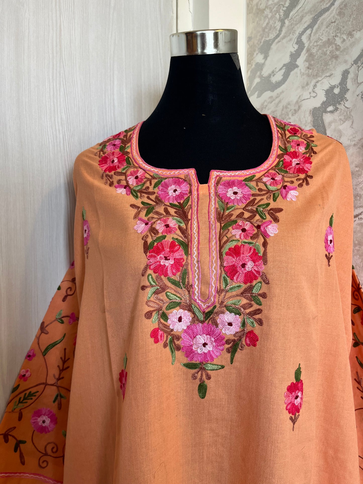 ‘Bageecha’ Peach Cotton Semi Stitched Cream Aari Work Kurti