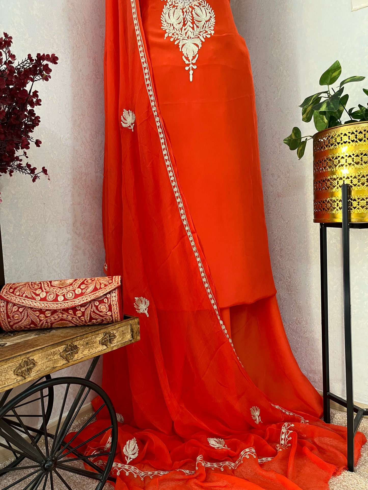 Orange Crape Kashmiri Suit with Clutch