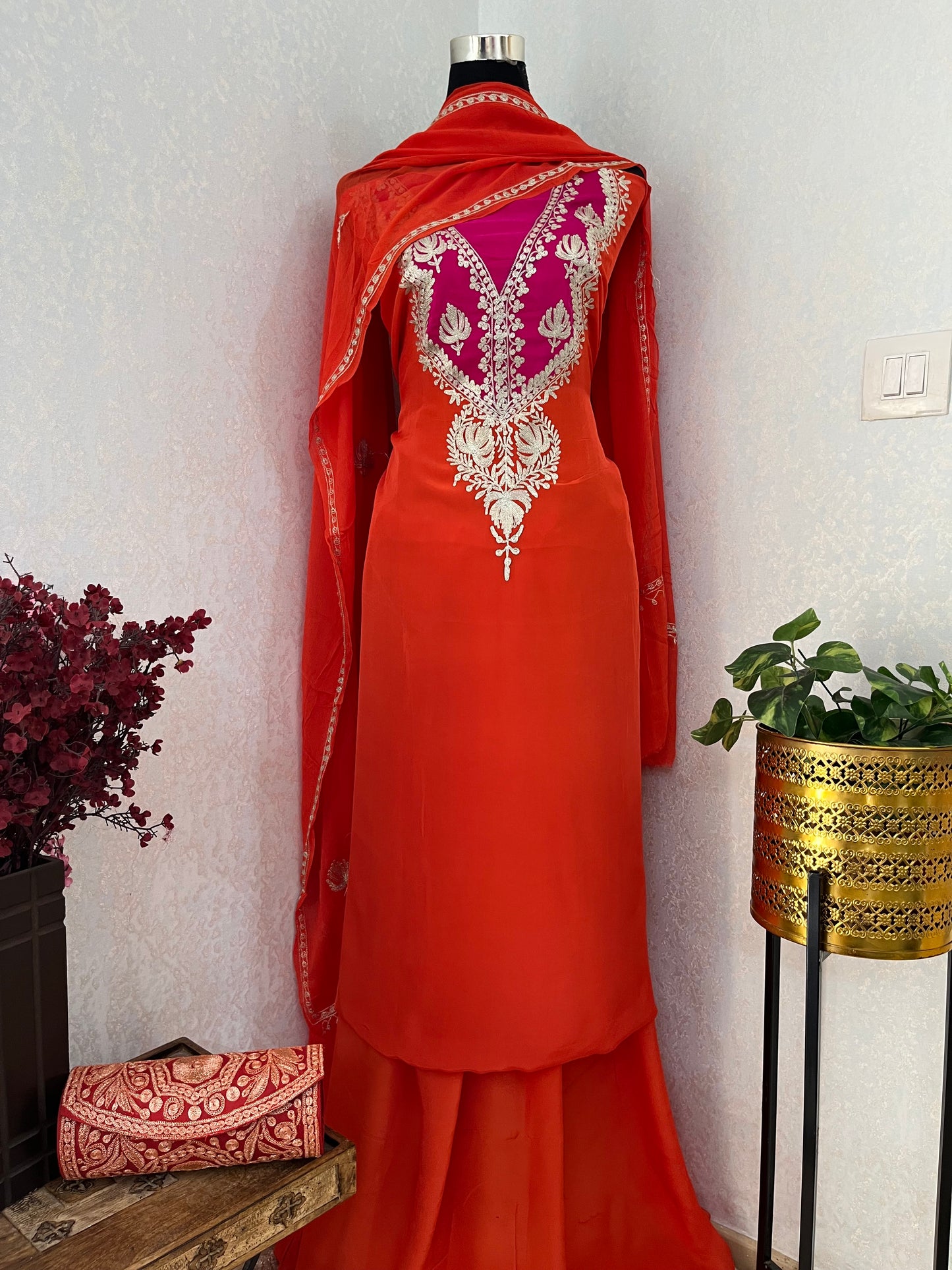 Orange Crape Kashmiri Suit with Clutch