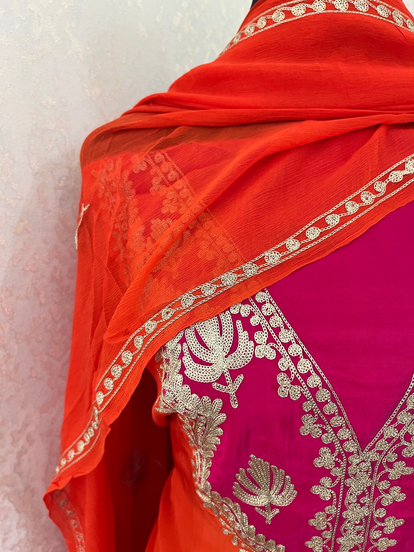 Orange Crape Kashmiri Suit with Clutch