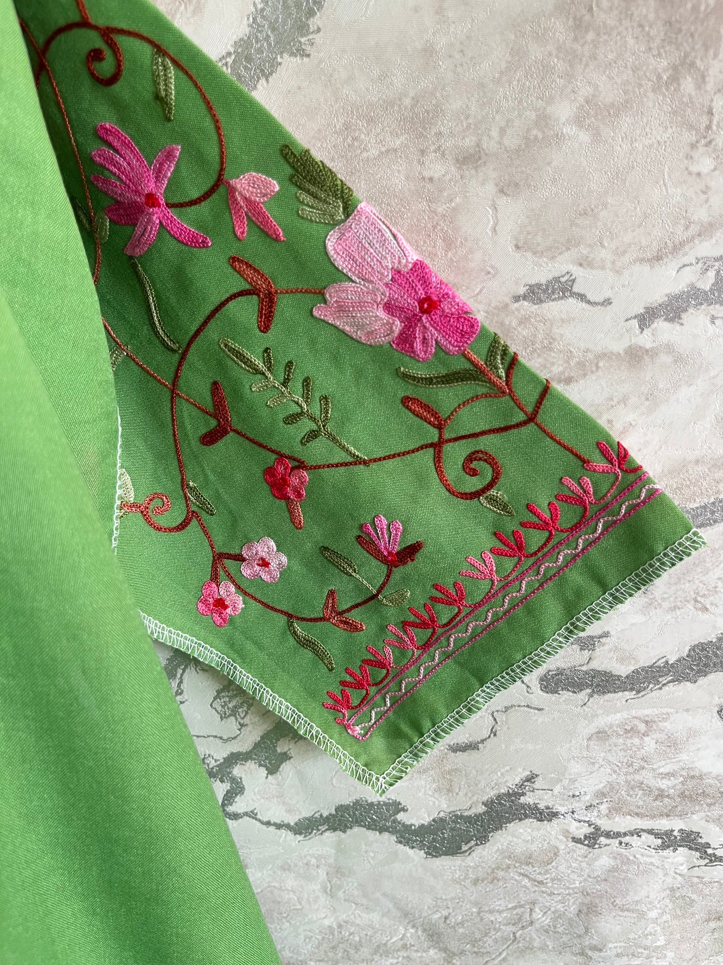 ‘Bageecha’ Parrot Green Cotton Semi Stitched Cream Aari Work Kurti