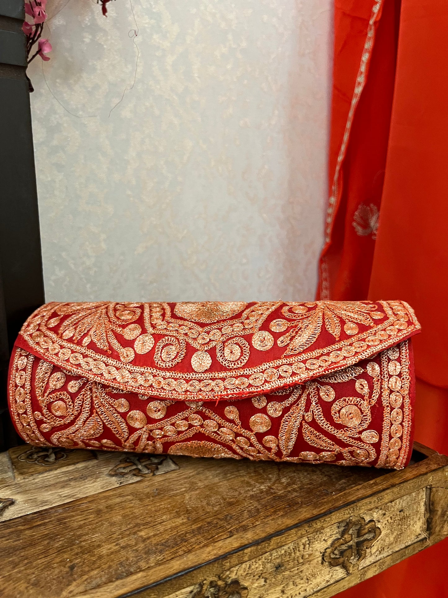Orange Crape Kashmiri Suit with Clutch